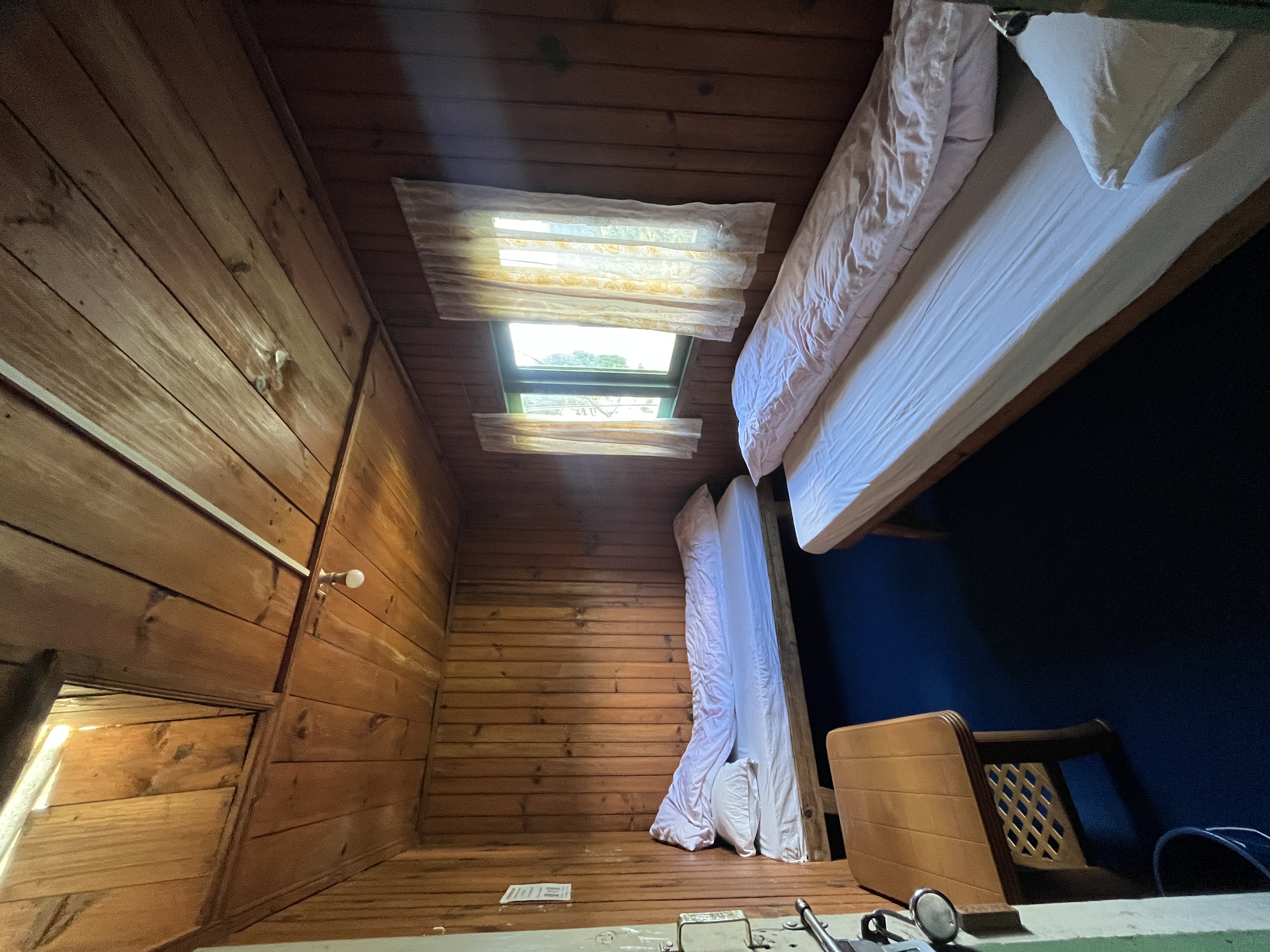 Room interior with wooden paneling